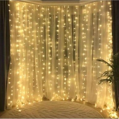 Girlianda užuolaida krioklys skaidriu laidu 3 x 3m 480LED Šiltai balta Girlianda užuolaida krioklys skaidriu laidu 3 x 3m 480LED Šiltai balta