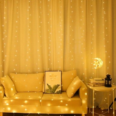 Girlianda užuolaida labai plonu skaidriu laidu su nuotoliniu valdymu 3 x 3m 300LED Šiltai balta 1 Girlianda užuolaida labai plonu skaidriu laidu su nuotoliniu valdymu 3 x 3m 300LED Šiltai balta 1