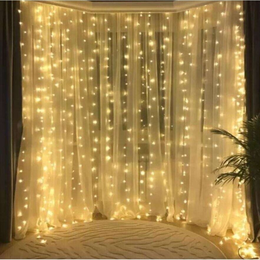Girlianda užuolaida krioklys skaidriu laidu 3 x 3m 480LED Šiltai balta Girlianda užuolaida krioklys skaidriu laidu 3 x 3m 480LED Šiltai balta